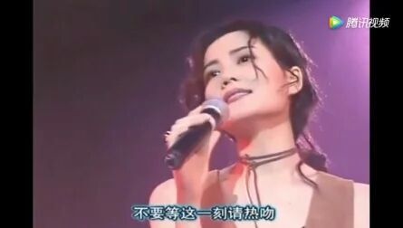 [图]王菲- 容易受伤的女人 (现场)