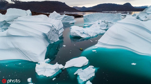 格陵兰岛冰封下的隐秘世界 78年老船在冰拱道下宛如被时光冻结(5) 第5页
